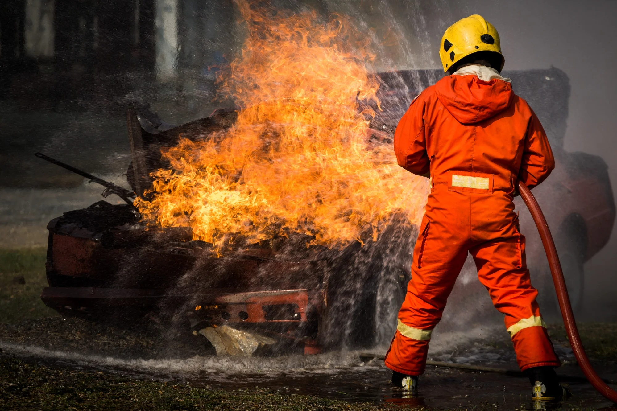 firefighters training team practice to fighting with fire in emergency situation (1)